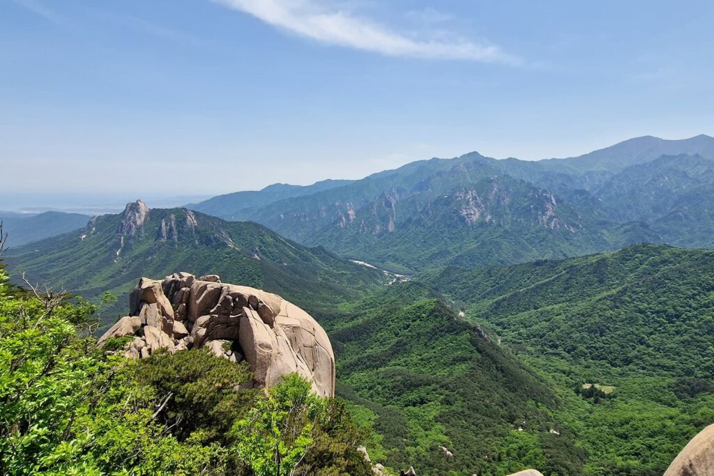 green mountains inside seoraksan national park in the distance