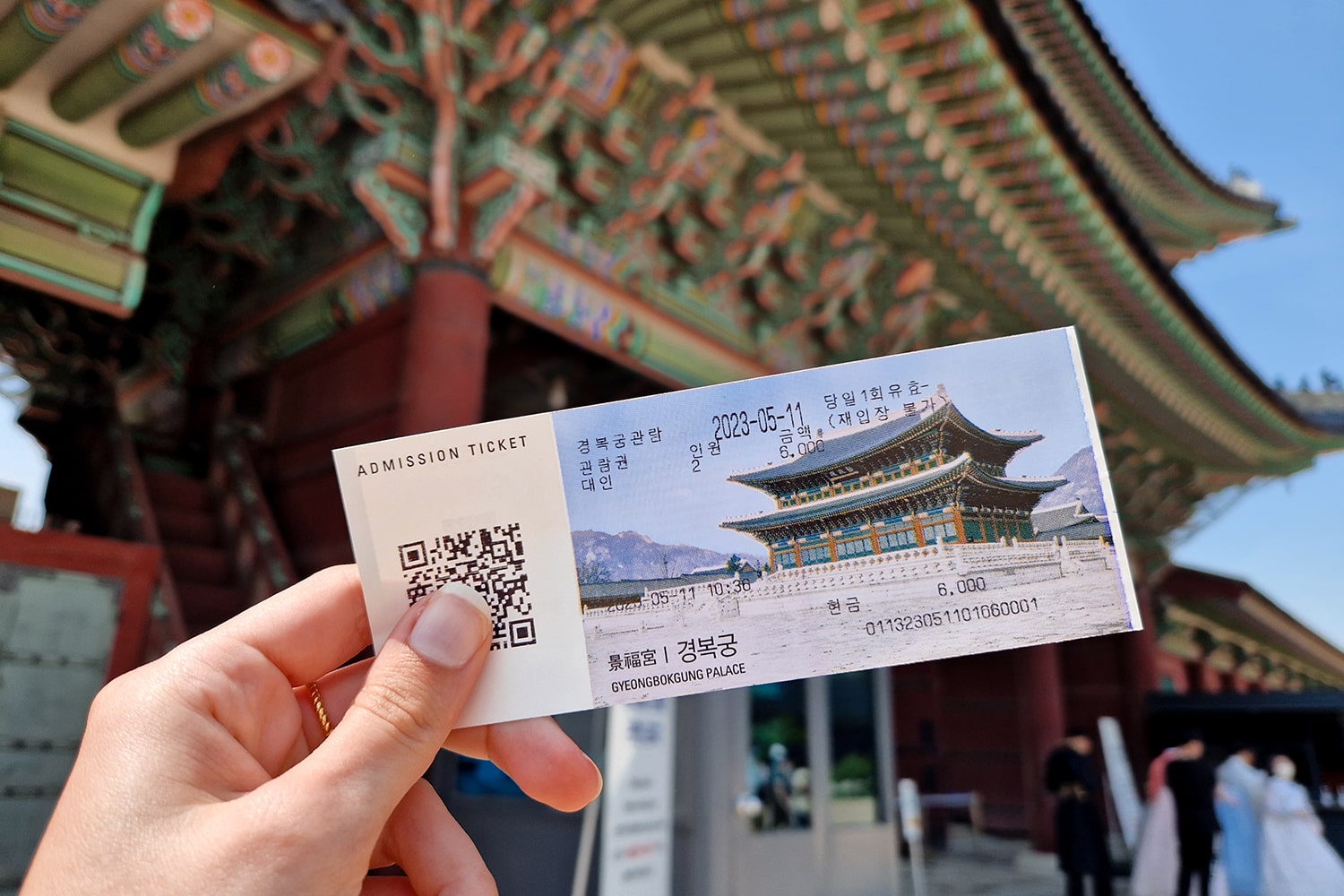 An entry ticket for Gyeongbokgung  Palaye in Seoul with date of purchase on the right and QR Code for scanning on the left.