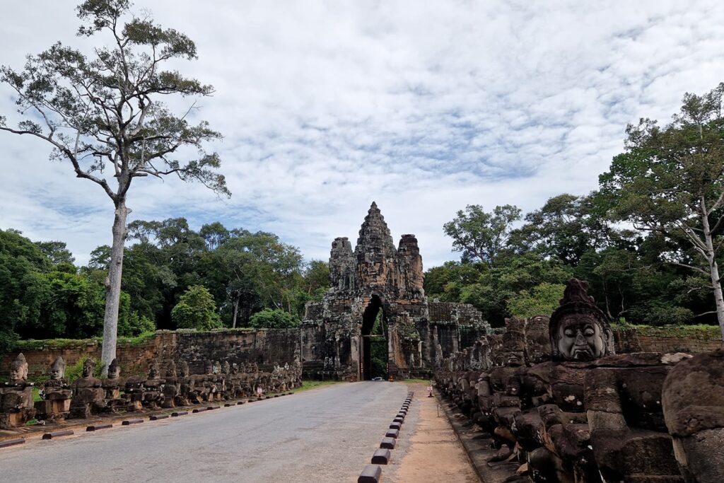 On of the gates used to enter Angkor Thom with a bridge leading to it.