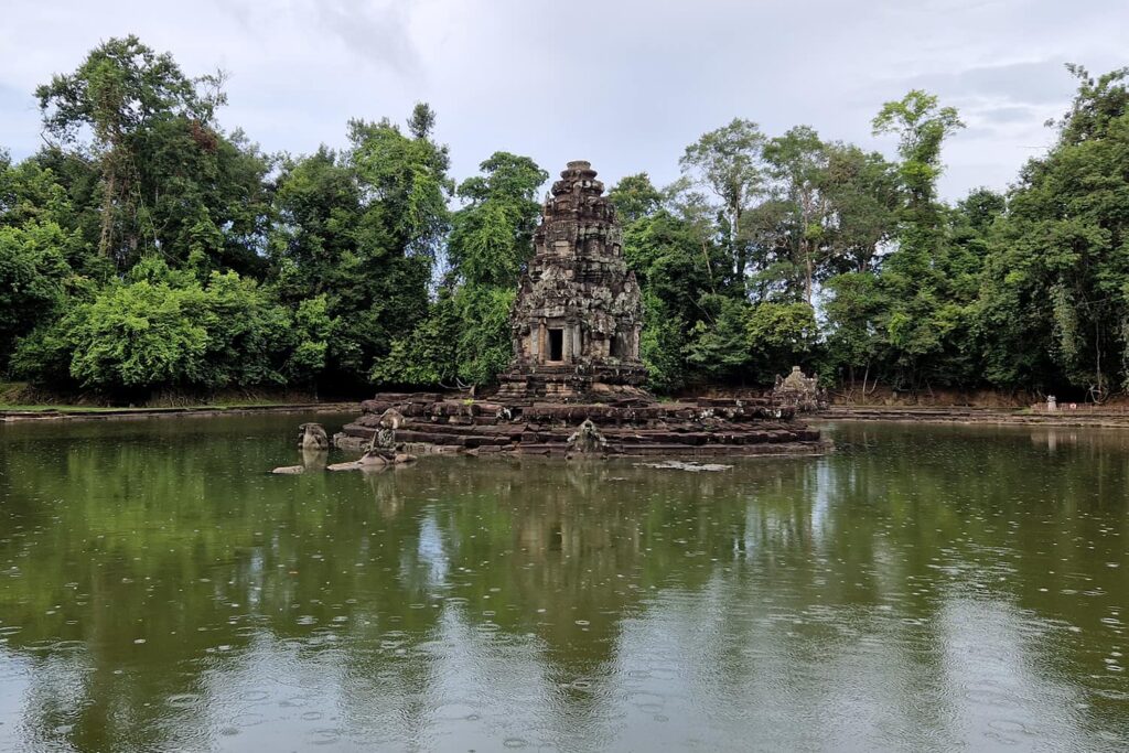 The unusual Neak Pean temple build into the middle of Jaytataka Baray, a rectangular water reservoir.