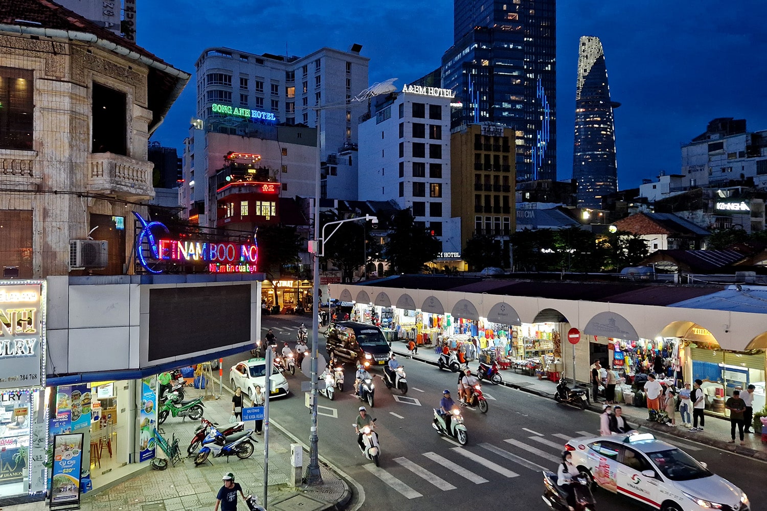 Night view from a cafe to one of the entrances of thanh market.