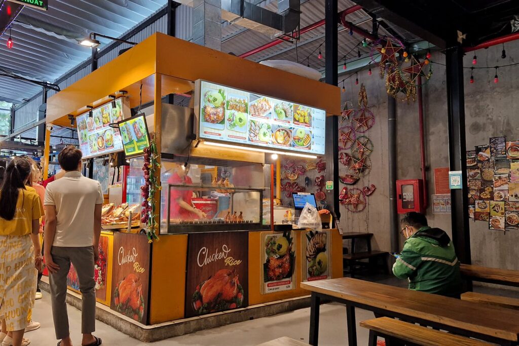 Food stall inside a street food market hall.