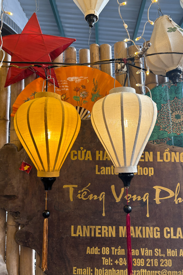 Two DIY Lanterns, one yellow the other one white.
